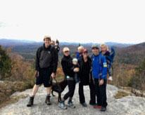 Dan Austin (Class of 2020) and Mike Torchia (Class of 2021) with their families on a local hike
