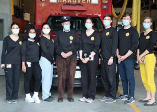 Dermatology resident’s and faculty volunteer at the annual skin screening for local firefighters