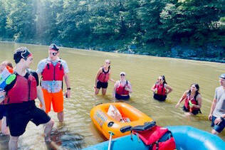Neurology Residents rafting at a retreat