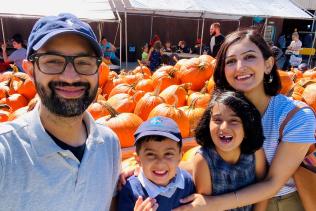 Imad Khan and family in pumpkin patch