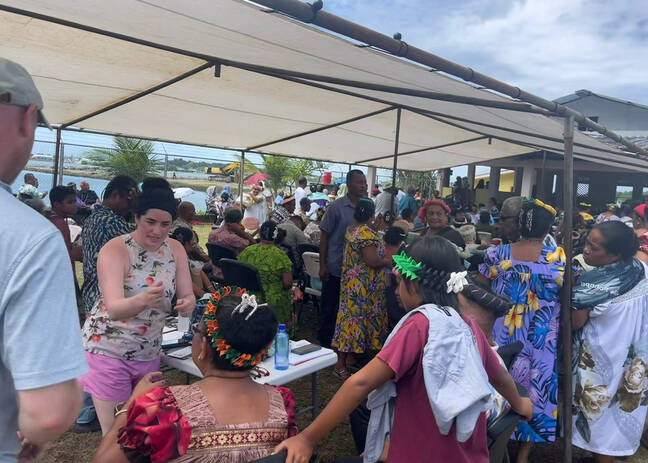 Emily Levine performing eye exam in Pingelaps, Micronesia