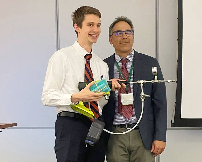 Grant Schultheis with prototype for corneal sensation device
